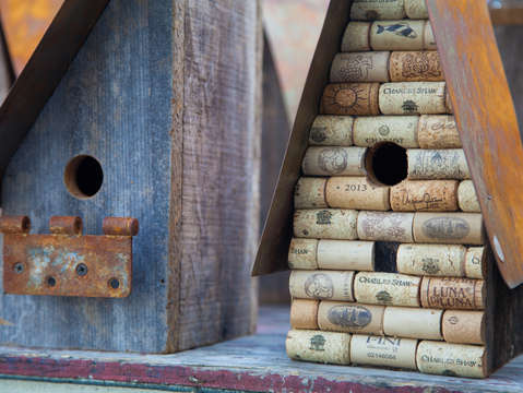 Two birdhouses from found materials