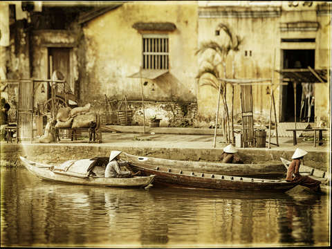 Three women in boats