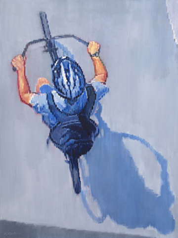 Boy riding bicycle at the beach