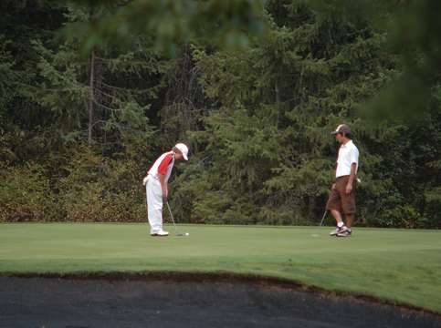 Boys putting on green