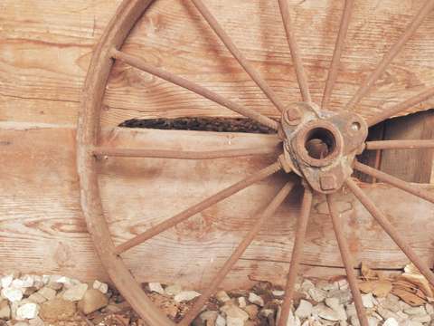 Wagon wheel on barn
