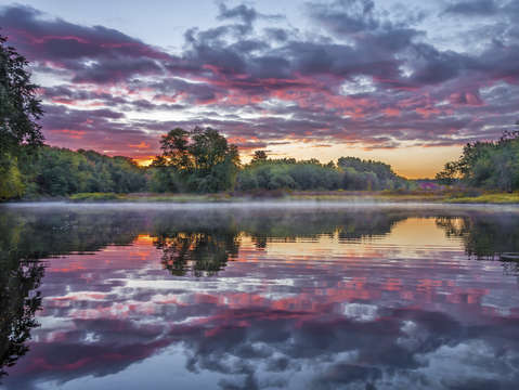 Dawn river reflection