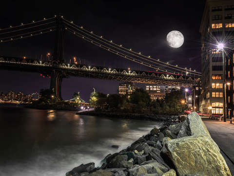 Moon rise over manhattan bridge