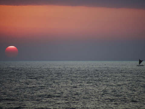Sailboat at sunset kona hawaii