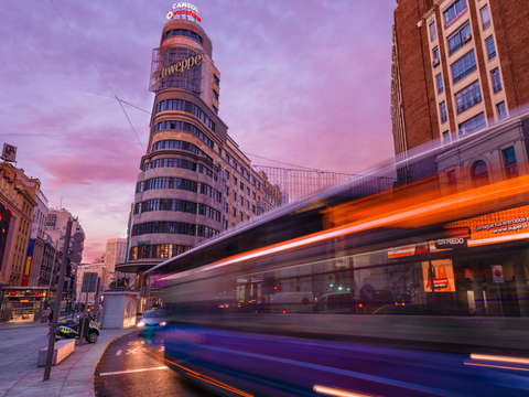 Sunrise from gran v a in madrid