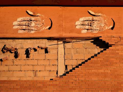 Hands and bricks 12