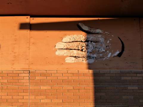 Hands and bricks 11