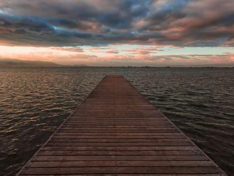 Clouds and sunset within the pier