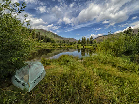 Rowboat on pond