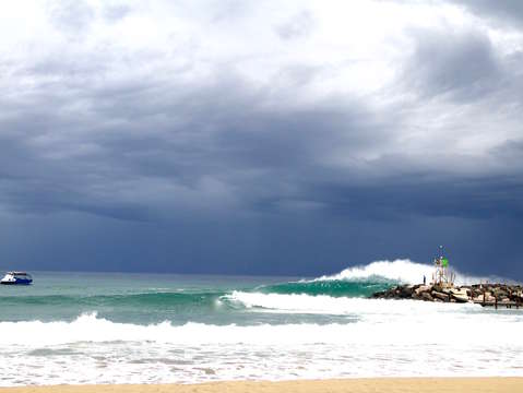 Wave on jetty