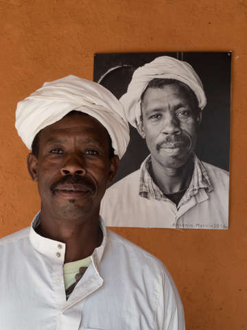 Man with picture of himself