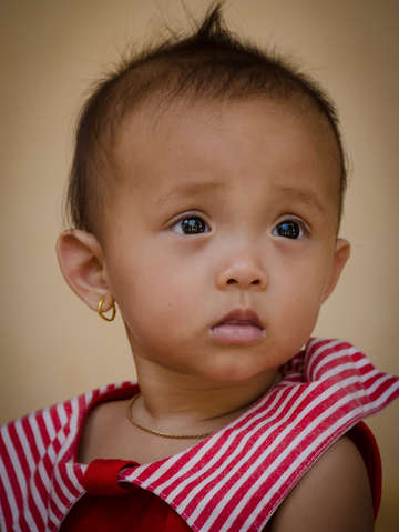 Little girl in red striped dress