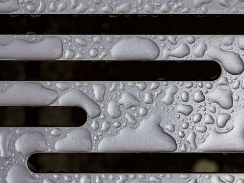 Raindrops on metal