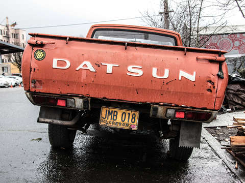 Orange datsun pickup