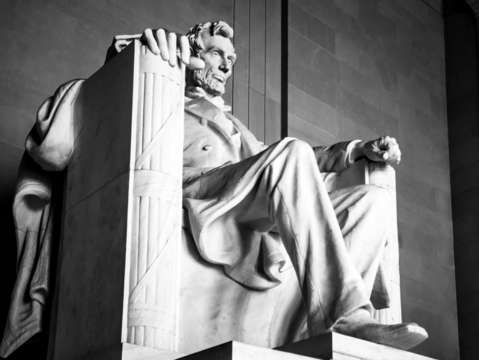 Lincoln statue seated in black and white