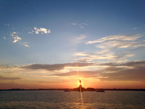 Statue of liberty during sunset