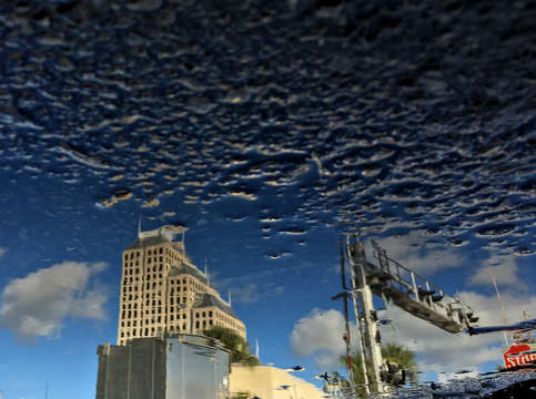 Building blue sky fade to asphalt