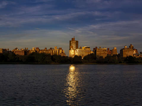 Central park reservoir at sunset looking east