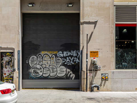 Graffiti next to blick art store soho new york cit
