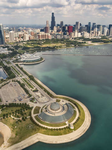 Adler planetarium shedd and chicago skyline