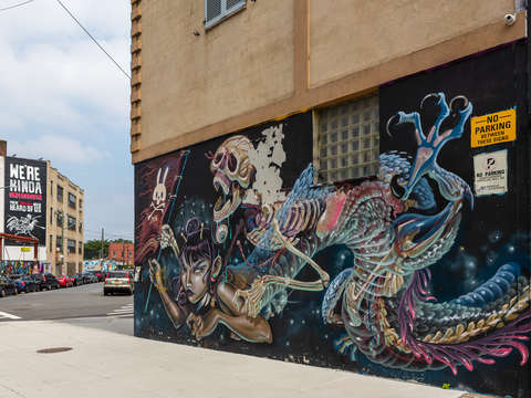 No parking by the dragon skeleton lady