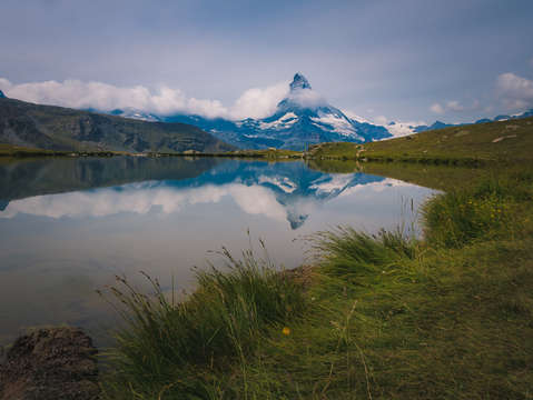 Stellisee lake 2537 m with the reflection of the m