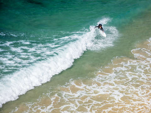 Green water surfer