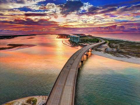 Across the perdido pass bridge v2 pink sky