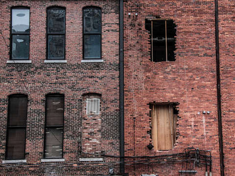Holes in a brick wall
