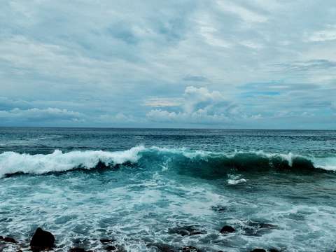 Ocean wave and stormy sky