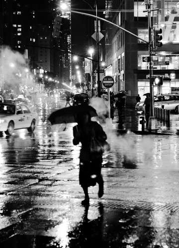 Woman in rain black and white