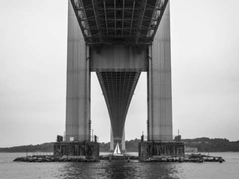 Sailboat under the verrazzano narrows bridge