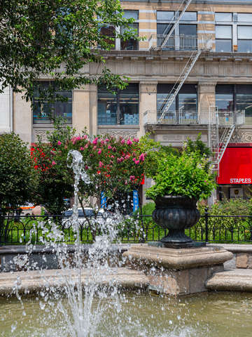 Sprinkler in front of spingler building union squa