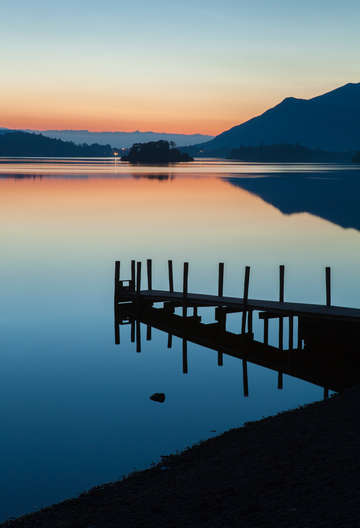 Lake district jetty at sunset england
