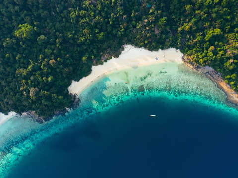 Aerial view of tropical island beach and coral r 3