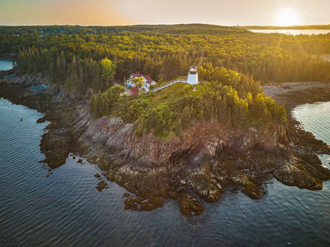 Maines owl head lighthouse at sunset