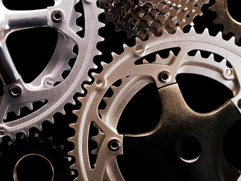 Bicycle gears on black background