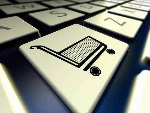 Computer keyboard with shopping card icon