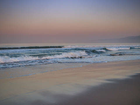 Sunrise waves crashing in cali