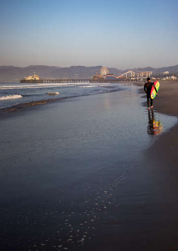 Surfer headed out to the break