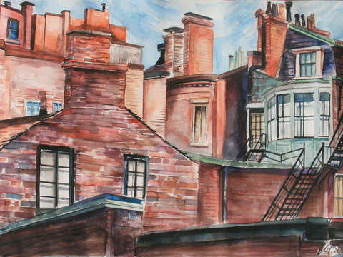 Orange and red chimneys under a pale blue sky