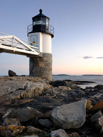 The marshall point lighthouse at low tide