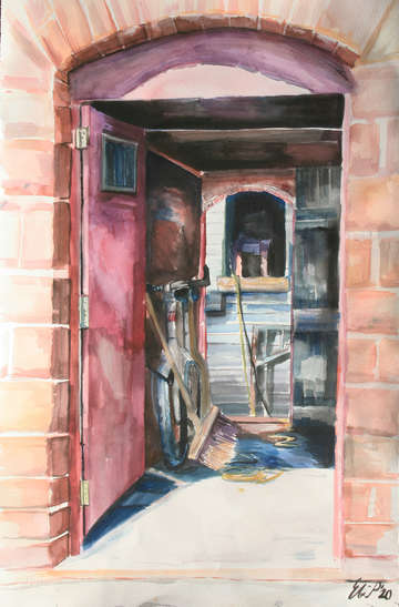 Doorway with bicycle and broom