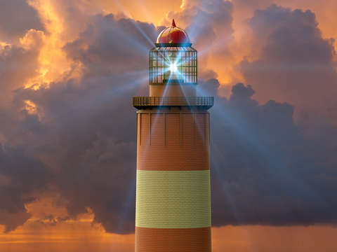 Lighthouse against a sunset