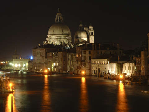 Nighttime along the grand canal venice italy