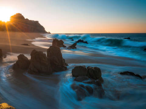 Dawn over cabo cliffs