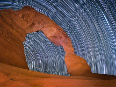 Star trails at delicate arch