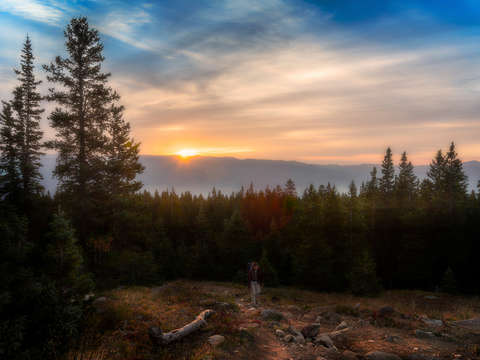 Mountain hiker at daybreak