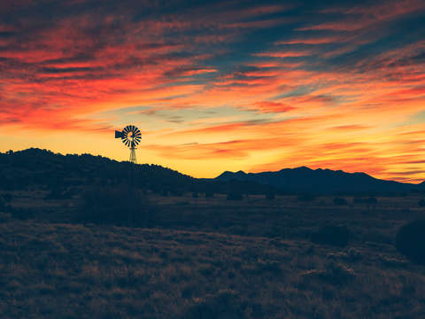 Desert windmill sunset