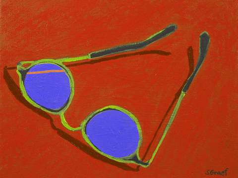 Sunglasses on red